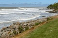 Big waves and huge boulders on the Pacific Ocean coast near the Kaka Point