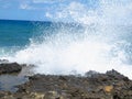 Big waves on rock coast blue sea and sky on Crete Royalty Free Stock Photo