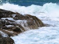 Big waves on rock coast blue sea and sky on Crete Royalty Free Stock Photo