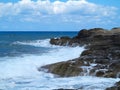 Big waves on rock coast blue sea and sky on Crete Royalty Free Stock Photo