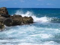 Big waves on rock coast blue sea and sky on Crete Royalty Free Stock Photo