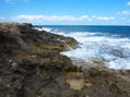 Big waves on rock coast blue sea and sky on Crete Royalty Free Stock Photo