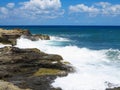 Big waves on rock coast blue sea and sky on Crete Royalty Free Stock Photo