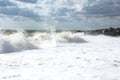 Big waves roll up on the beach