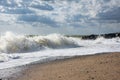 Big waves roll up on the beach