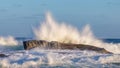 Big waves splashing on a rock in a spanish coastal, near the town Palamos