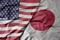 big waving colorful flag of united states of america and national flag of japan Royalty Free Stock Photo