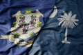 big waving colorful national flag of south carolina state and flag of connecticut state