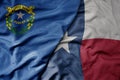 big waving colorful national flag of texas state and flag of nevada state Royalty Free Stock Photo