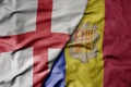 big waving national colorful flag of england and national flag of andorra Royalty Free Stock Photo