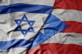 big waving national colorful flag of israel and national flag of puerto rico Royalty Free Stock Photo