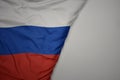 big waving national colorful flag of russia on the gray background Royalty Free Stock Photo