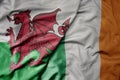 big waving national colorful flag of wales and national flag of ireland Royalty Free Stock Photo