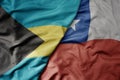 big waving realistic national colorful flag of bahamas and national flag of chile Royalty Free Stock Photo