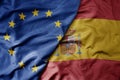 big waving realistic national colorful flag of european union and national flag of spain Royalty Free Stock Photo