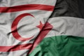 big waving realistic national colorful flag of northern cyprus and national flag of palestine