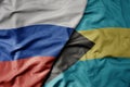 big waving realistic national colorful flag of russia and national flag of bahamas Royalty Free Stock Photo