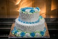 Big wedding cake with blue flowers Royalty Free Stock Photo