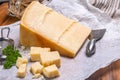 Big wedge of parmigiano-reggiano parmesan hard Italian cheese made from cow milk or Grana Padano Royalty Free Stock Photo