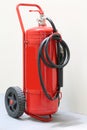 Big wheeled fire extinguisher Royalty Free Stock Photo