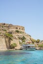 Big white boat near the castle on the island of Spinalonga Royalty Free Stock Photo