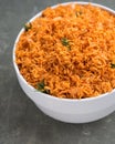 A big white bowl filled with tasty Nigerian Jollof Rice Royalty Free Stock Photo