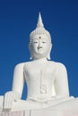 Big white buddha statue on blue sky Royalty Free Stock Photo