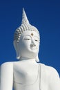 Big white buddha statue on blue sky Royalty Free Stock Photo