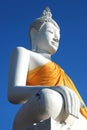 Big white buddha statue on blue sky Royalty Free Stock Photo