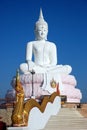 Big white buddha statue with serpent king on stairs Royalty Free Stock Photo