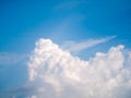 Big white clouds, in the middle of the picture, blue sky,. Royalty Free Stock Photo