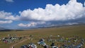 Big white clouds over green hills and mountains. Royalty Free Stock Photo