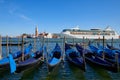 Big white cruise ship passing in Grand Canal in Venice, Italy