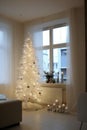 Big white decorated Christmas tree with lights stand near window in small white living room. Royalty Free Stock Photo