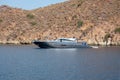 Big white modern yacht moored in Aegean sea near Turkey coast. Luxury white boat yacht against of the resort city. Ships Royalty Free Stock Photo