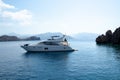 Big white modern yacht moored in Aegean sea near Turkey coast. Luxury white boat yacht against of the resort city. Ships Royalty Free Stock Photo