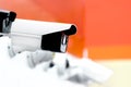 Big white professional surveillance camera. Wall mounted CCTV. Security system concept. Copyspace