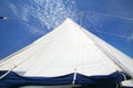 Big white sail of modern yacht sailing on river at