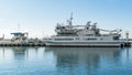 Big white three-deck motor ship `Dagomys` in Sochi Commercial Sea Port.