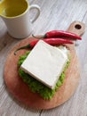 Big white tofu on the cutting board