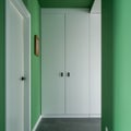 Big white wardrobe in green corridor Royalty Free Stock Photo
