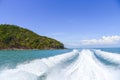 Big white wave and water splash from ferry boat sailing to Island. Royalty Free Stock Photo