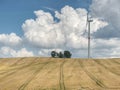 Big windmills at sunny day on green field.  Energy for free Royalty Free Stock Photo