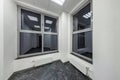 Big windows in empty unfurnished room interior in white style color in modern apartments, office or clinic