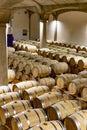 Big wine cellar with old oak barrels, production of red dry or sweet wine in Marsala, Sicily, Italy Royalty Free Stock Photo