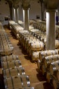 Big wine cellar with old oak barrels, production of red dry or sweet wine in Marsala, Sicily, Italy Royalty Free Stock Photo