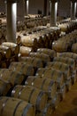 Big wine cellar with old oak barrels, production of red dry or sweet wine in Marsala, Sicily, Italy Royalty Free Stock Photo