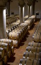 Big wine cellar with old oak barrels, production of red dry or sweet wine in Marsala, Sicily, Italy Royalty Free Stock Photo