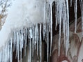 Big winter icicles at eaves on winter time - turturi periculosi la streasina