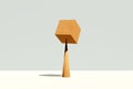 A big wooden cube block is balancing on a pike shaped cone